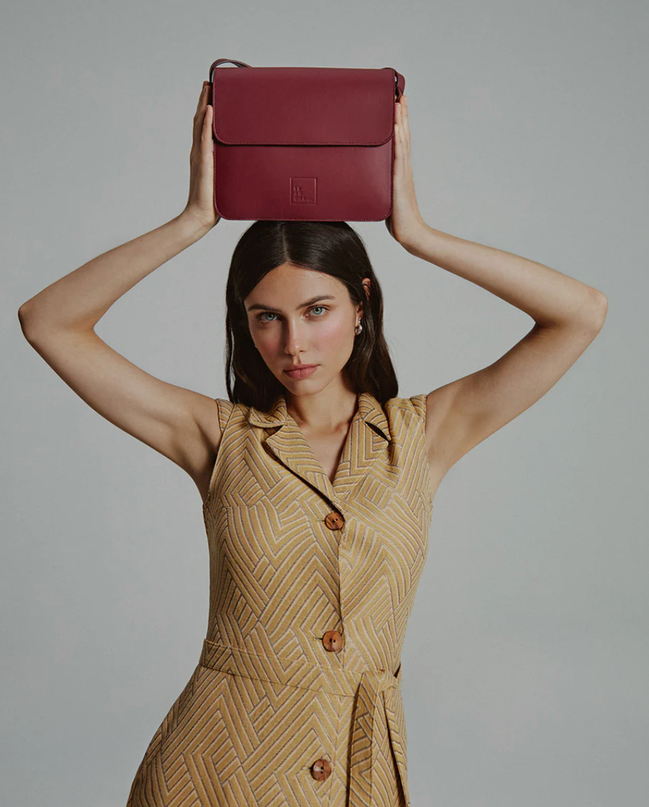 Burgundy leather square crossbody bag with flap