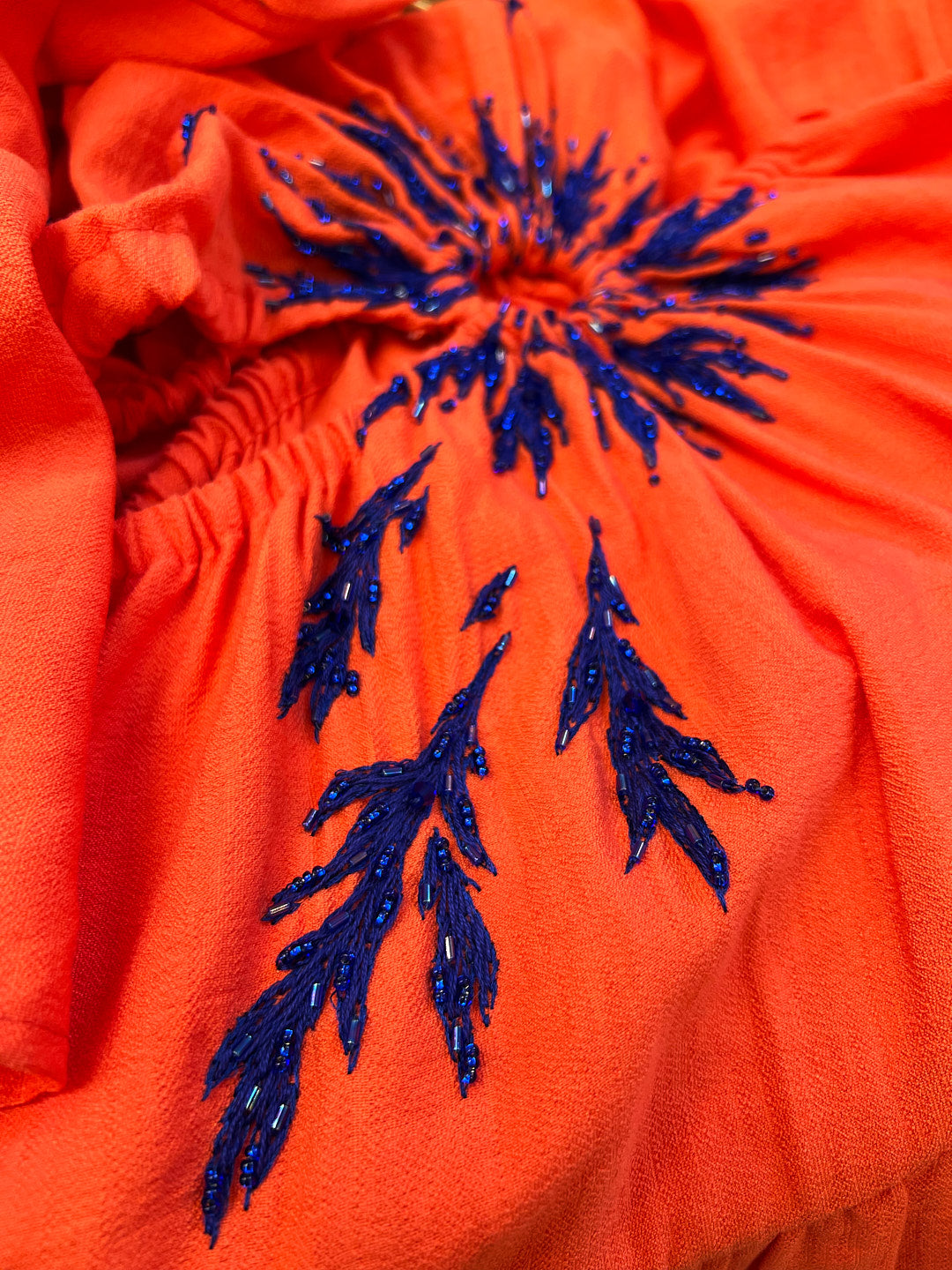Orange dress with hand-made embroidery