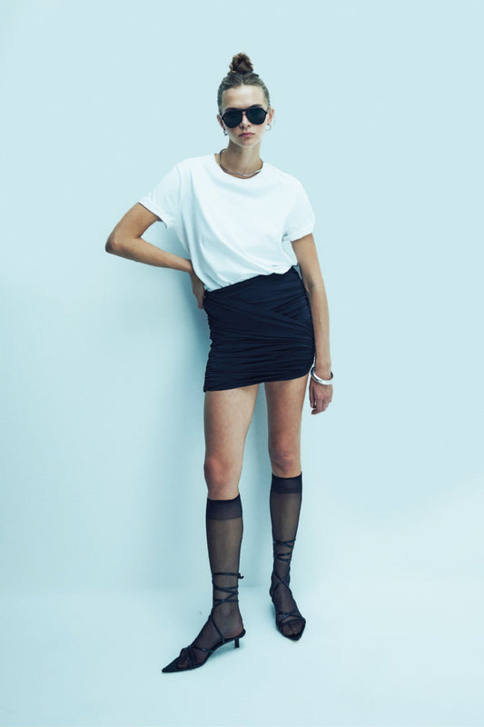 Micha Jersey Asymmetric Mini Skirt in Black