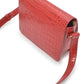 Square shoulder bag with printed red leather flap Crossbody Bags Leandra 