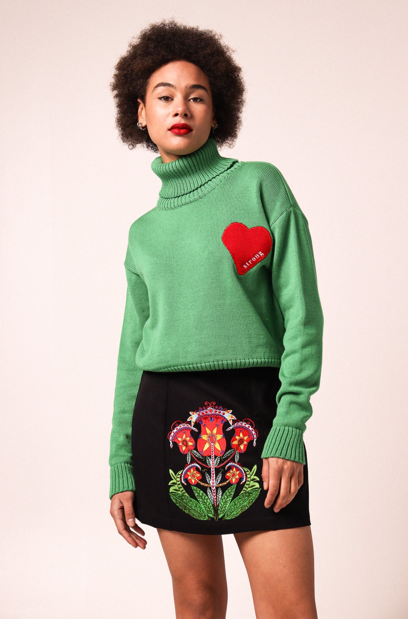 Black cotton turtle neck with a "heart" embroidery