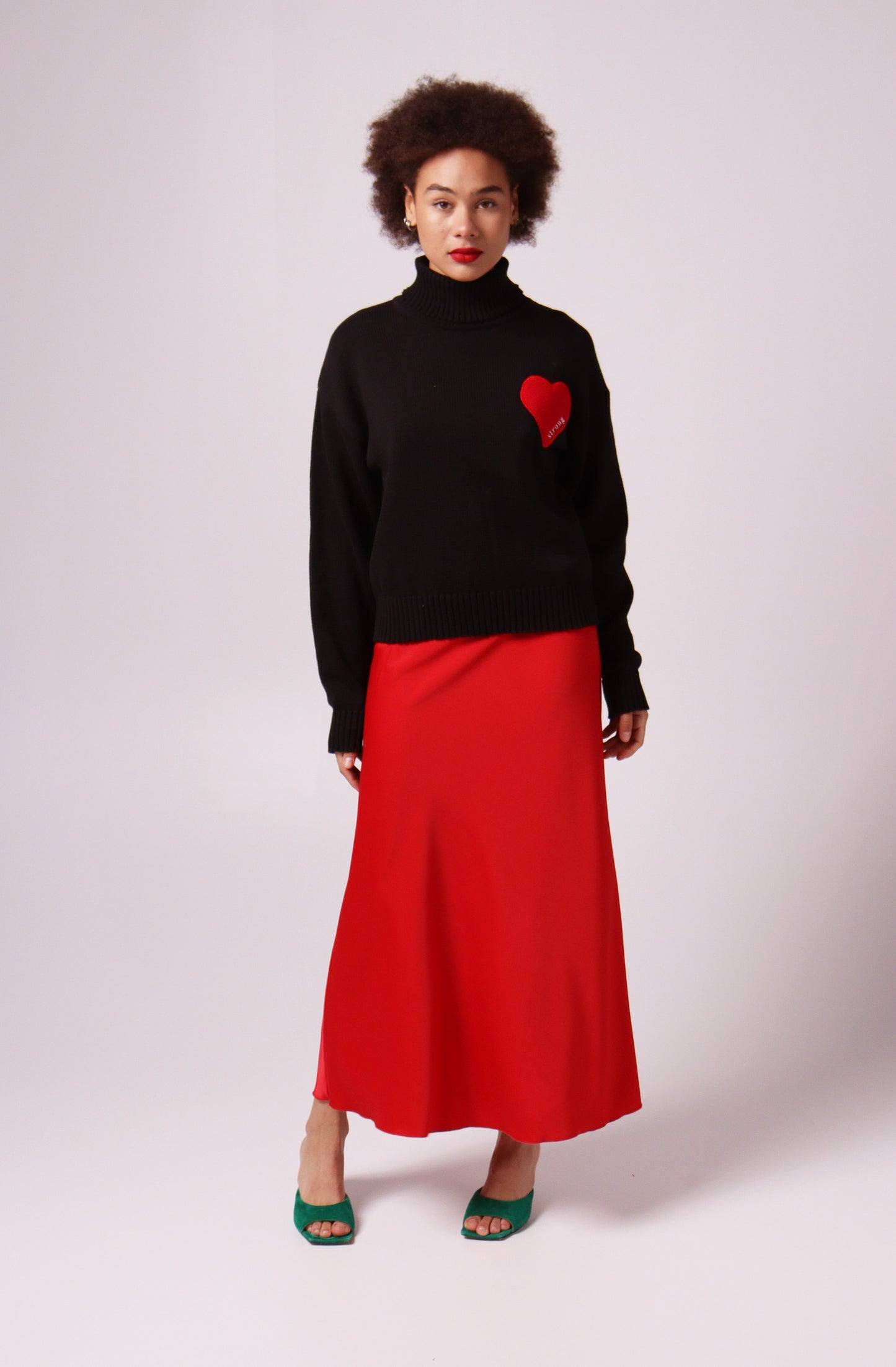 Black cotton turtle neck with a "heart" embroidery