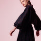 Dress with an author's print "Love is stronger than darkness"