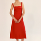 Loose fit dress with fitted bodice
