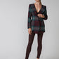 The Signature Jacket in structured British wool with a bold check in burgundy and teal.