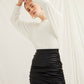 Chels Ruched Vegan Leather Mini Skirt in Black
